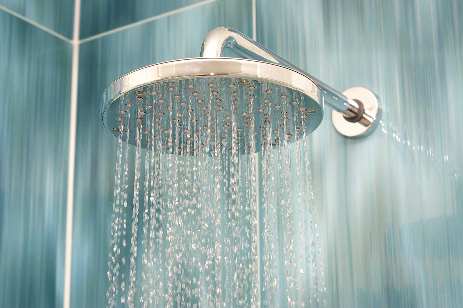hot water from a tankless water heater coming out a shower head