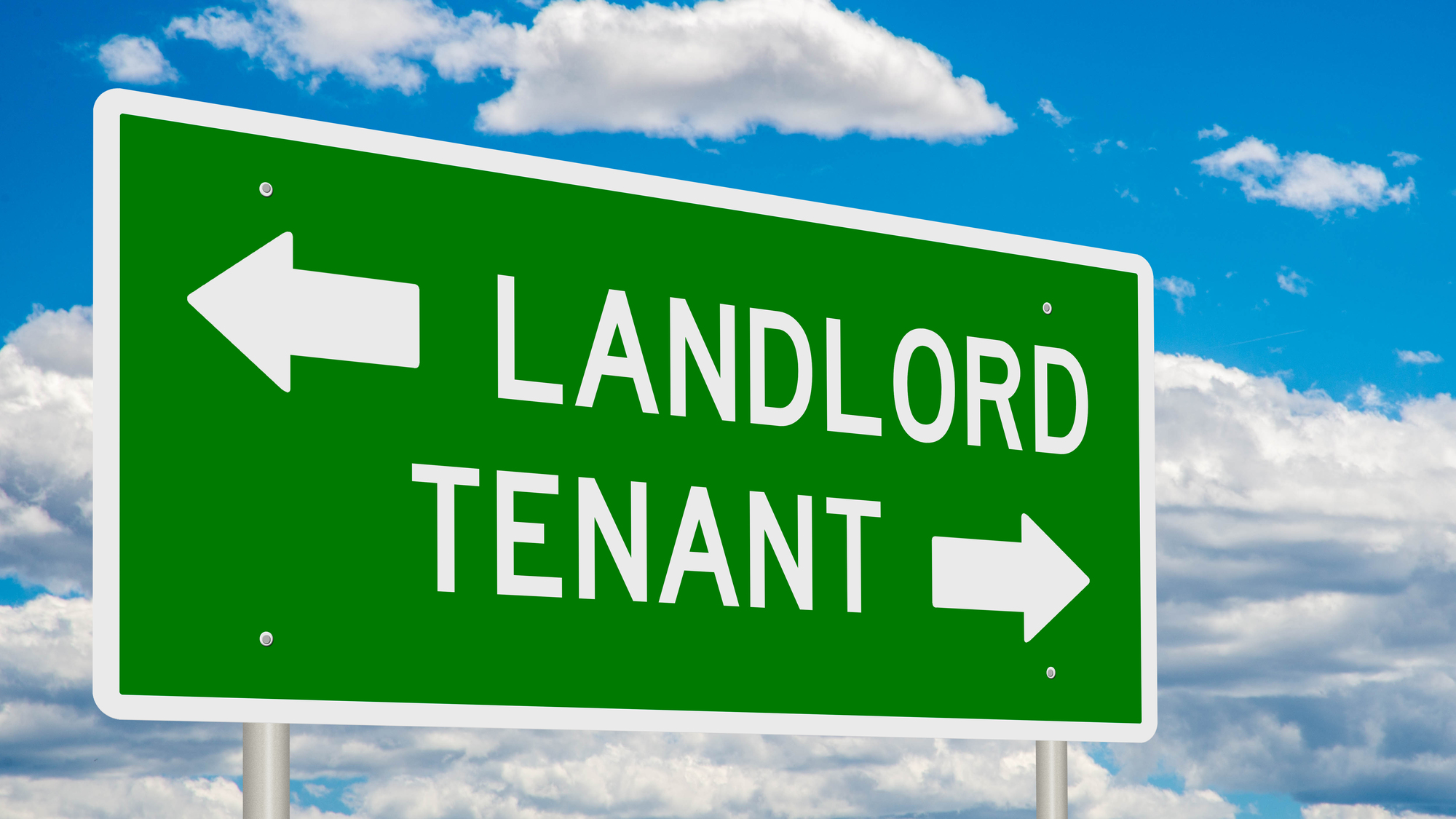 A signboard showing Landlord and Tenant written